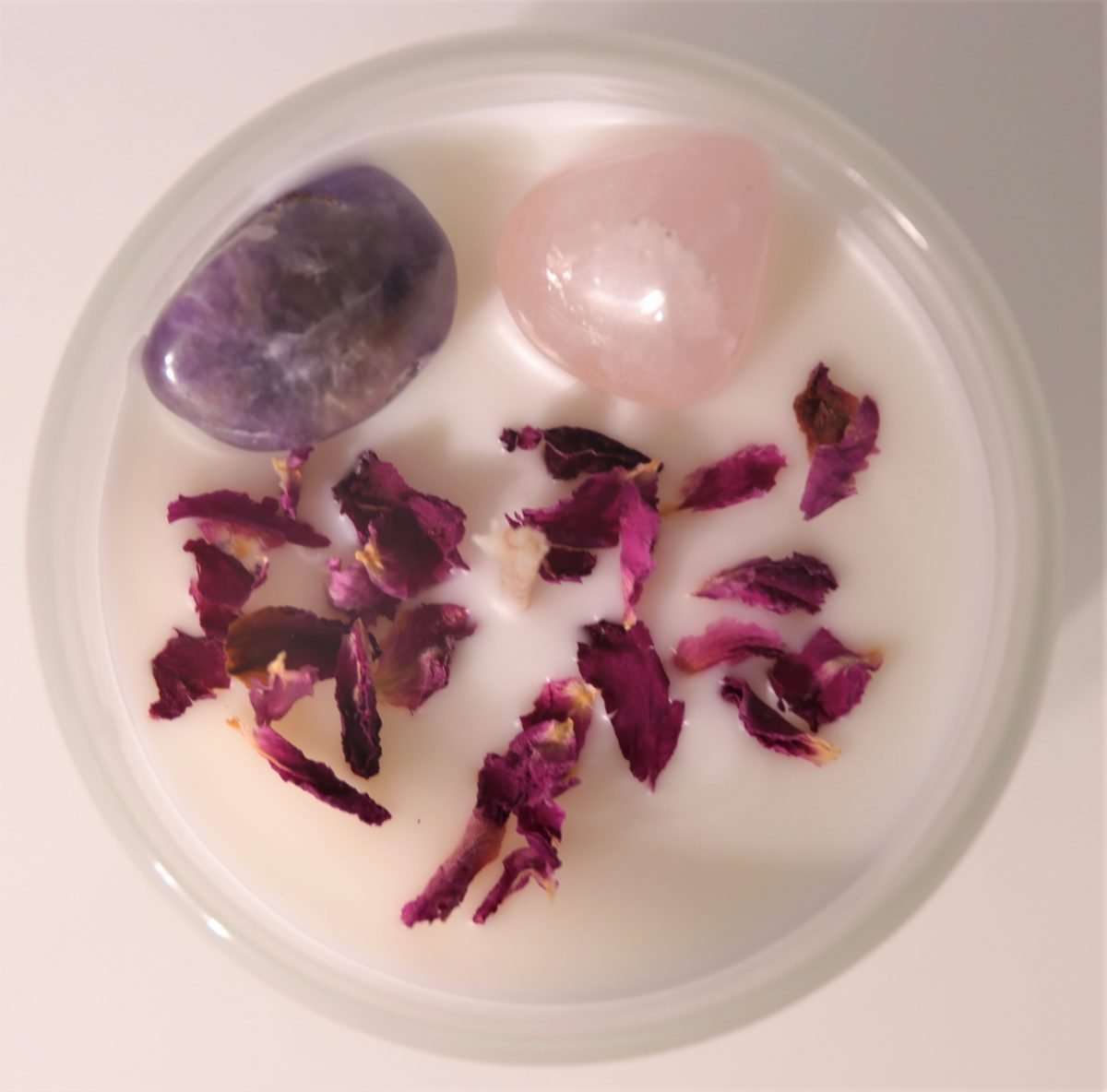 Crystal Soy Wax Candle Amethyst, Lavender, Cedarwood and Rose Petals  Comes with Amethyst, Lavender, Cedarwood and Rose Petals Natural Soy Wax.  40 hours burn time. 8×9.3cm with 200g wax.  SKU: CA12