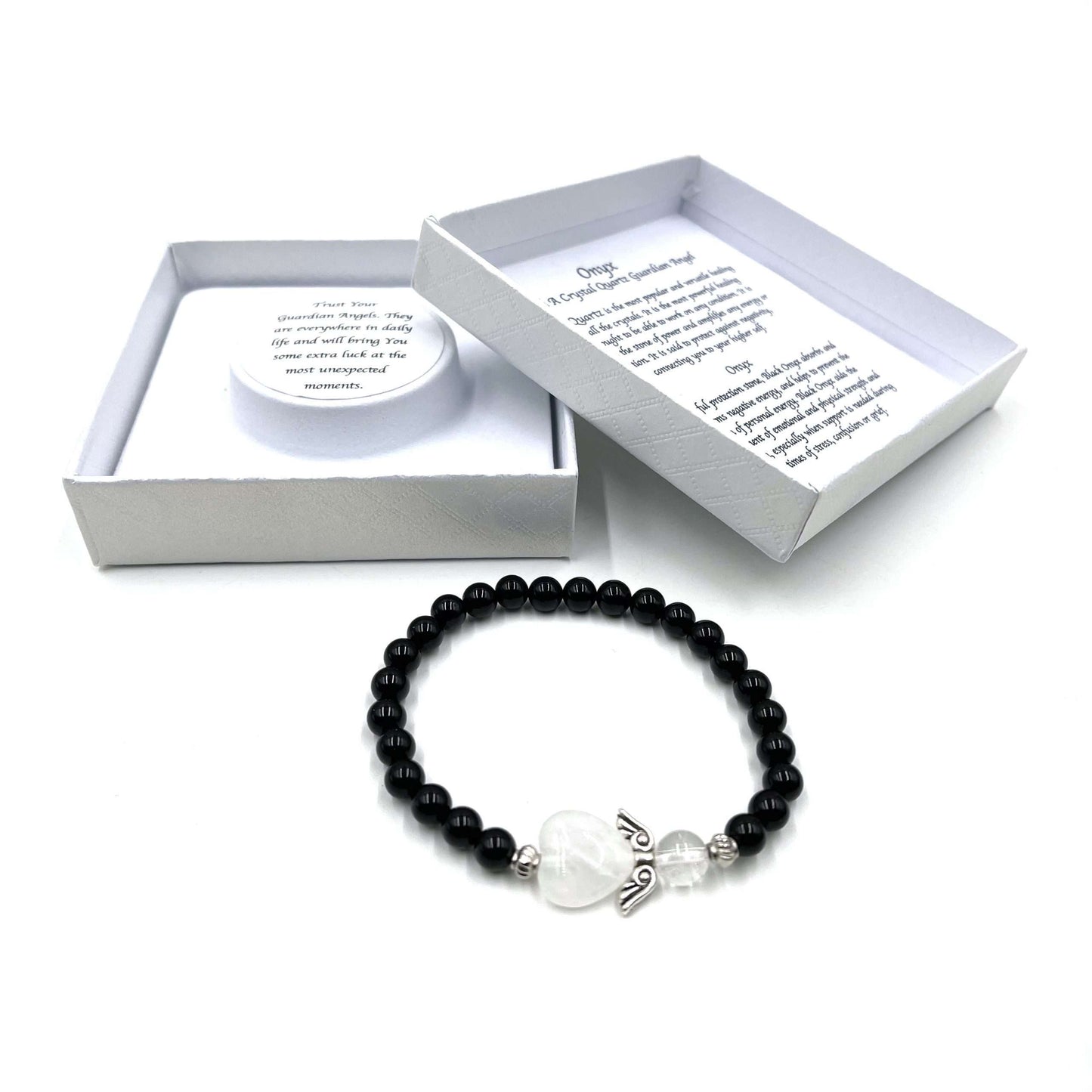 Black beaded bracelet with a heart charm on a white background