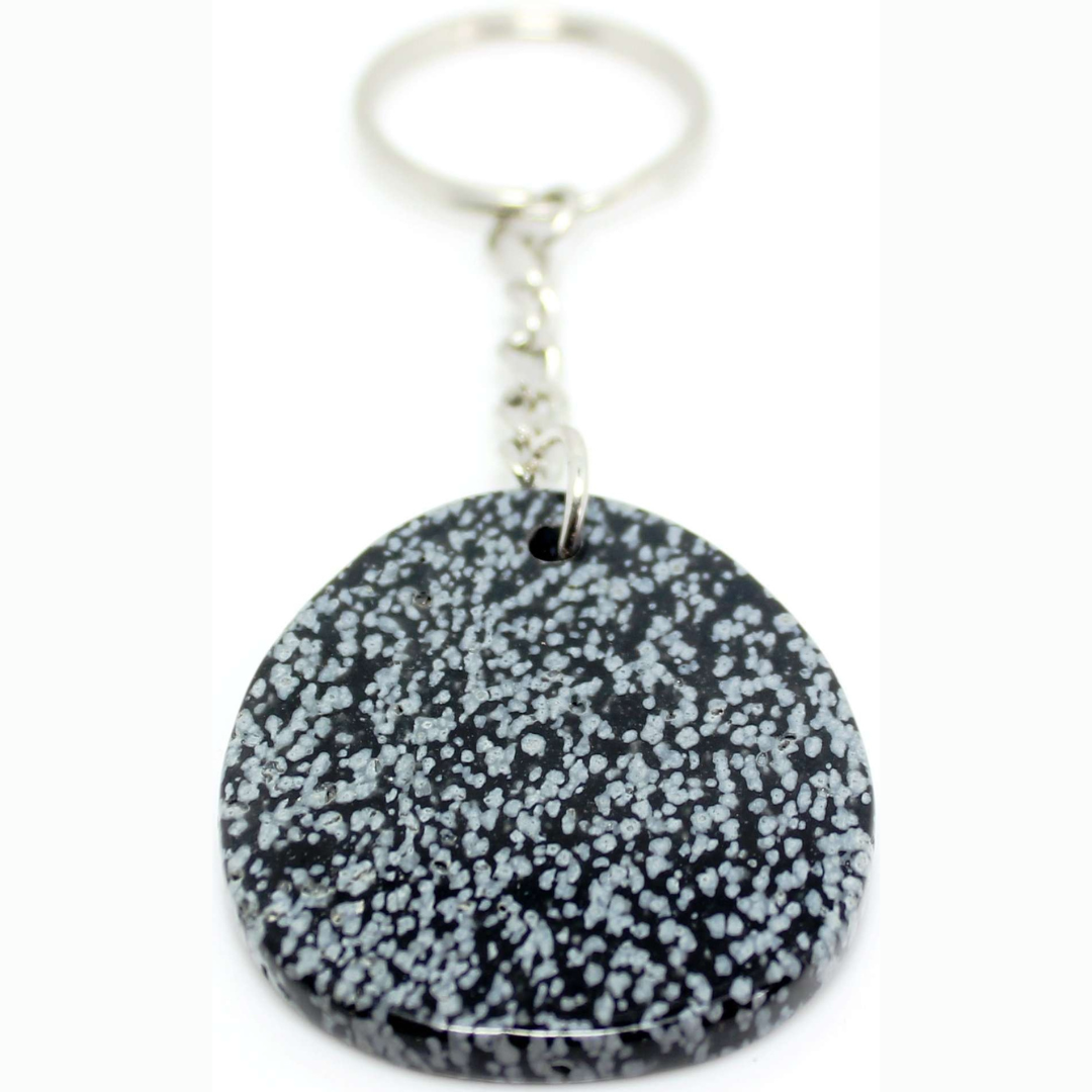 Zodiac Keyring Snowflake Obsidian Snowflake Obsidian – Capricorn: Associated with truth. Dissolves emotional blockages. Said to promote compassion and strength- Calming and soothing. Treats veins and skeleton. Clarity- Compassion, strength. Relieves ancient traumas. SKU: ZKOB