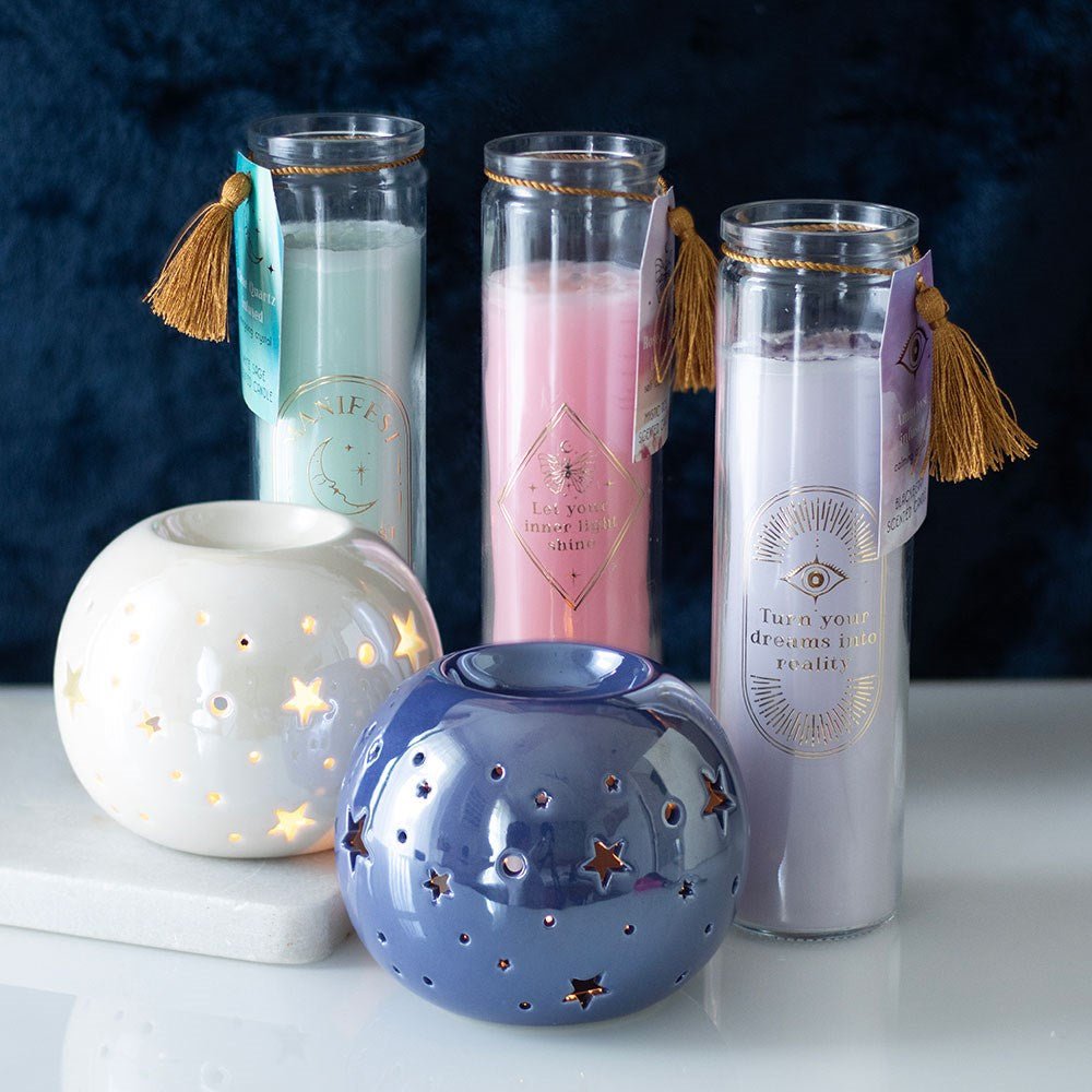 Mystic Rose Tube Candle with Rose Quartz Crystals
Inspired by traditional 7-day prayer candles, this tube candle comes in a beautiful mystical rose fragrance. Accented with gold 'Let your inner light shine' text and rose quartz crystal chips, this candle promotes self-love and confidence. Crystals will release from wax with use and can be reused for a multitude of spiritual purposes. Paraffin wax. Approximately 50 hours of burn time. 1st Stop, Marshall's Health Shop, Gift Shop!