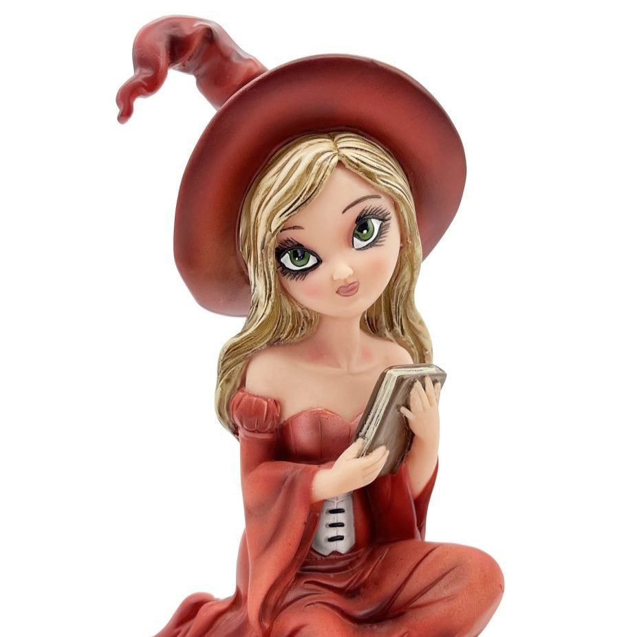 Witch Figurine With Book