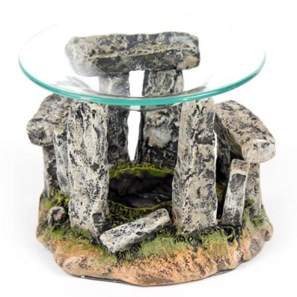 Stone Circle Oil Burner with Glass Dish Material: Resin and Glass Suitable for Use With: Water and oils. Candle Included: No Oils Included: No Removable Dish: Yes Safety Information: Always read and follow the instructions that come with this product. Use a good quality standard tea light and do not overfill the dish. Dimensions - Height 9cm Width 12.5cm Dish Diameter 12cm SKU: HMP01