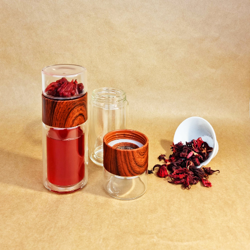 MagicT - Infuser Flask - Wood Look 250ml Magic T Infuser flask is the perfect tea vessel for busy days, office, camping or even a cup of tea in bed. This means anytime-anywhere. The Wood Look Magic Flask comes with a handy polyester sleeve cover. When you felt the tea is ready just turn it again and drink from the big bottle.
