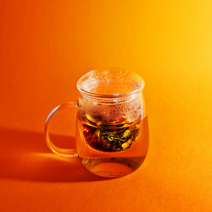 MagicT - Infuser Mug – Glass Lid 300ml 1st Stop, Marshall's Health Shop!  This infuser mug with a Glass lid looks elegant, unique and handy. It is ideal to see the colour of your herbal tea. The mug is made of high borosilicate glass and the glass lid allows to keep the heat and aroma of the tea inside the cup.