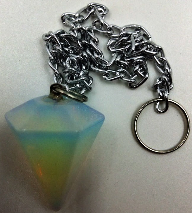 Cone Pendulums Artificial Opal Cone Pendulums- Artificial Opal Dimensions: Length of stone-3cm. Length from chain to the tip of the stone 29cm Size and colour are approximate and may vary. SKU: PLOP