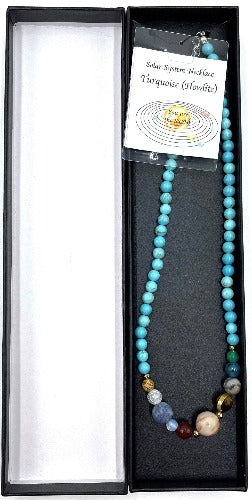 Solar System Necklace Turquoise (Howlite) Turquoise (Howlite) has a calming effect and has a strong positive energy. The stone helps the bearer to control anger and be less critical. It stimulates ambition and patience, but also strengthens the memory and promotes the eagerness to learn. The stone may help reduce insomnia due to its strong calming effect. Size of bead 0.6cm SKU: SN1