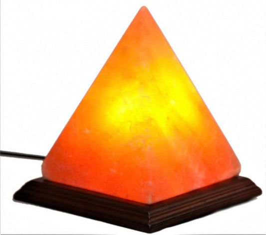 Himalayan Salt Lamp Pyramid Shaped (SPY6) Capture the ambience of the Egyptian pyramids! This Beautify, hand carved salt lamp sits on a stylish wooden base. It brings a warm glow to your living spaces as it cleans and purifies the air.  Pyramid shaped plug-in lamp on a wood base  Each lamp is hand carved from 100% natural Himalayan salt  Salt lamps create a soothing amber glow  Authentic Himalayan Salt Lamp. Each item comes with an electric cable and a bulb.  Dimensions: Height 15cm  SKU: SPY6