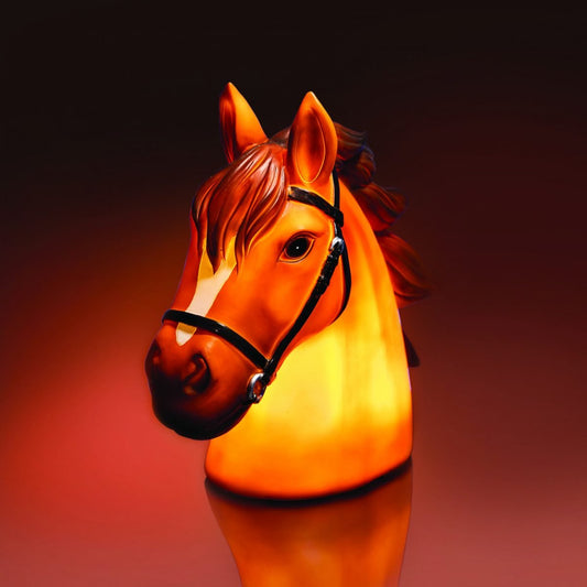 Horse Table Lamp LED table lamp of a beautiful horse with a dark brown mane Makes a great ornament during the day and lights up the room at night Low voltage LED safe for children This beautiful Horse Table Lamp is the perfect combo of function and decor! It blends right into your room during the day, and lights up with a golden glow at night. Also great for bedtime stories or as a nightlight to ensure sweet dreams for your little one. 