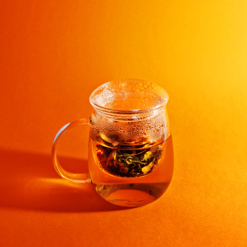 MagicT - Infuser Mug – Glass Lid 300ml 1st Stop, Marshall's Health Shop! This infuser mug with a Glass lid looks elegant, unique and handy. It is ideal to see the colour of your herbal tea. The mug is made of high borosilicate glass and the glass lid allows to keep the heat and aroma of the tea inside the cup.