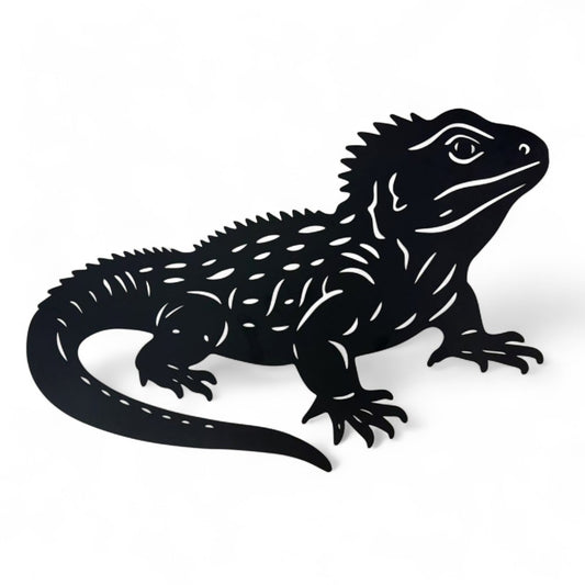 Wall Art - Steel - NZ Tuatara

L:60 cm - The tuatara is a rare reptile found only in Aotearoa (New Zealand). A true "living fossil", it has existed since the time of the dinosaurs. Recognisable by its spiny back, the tuatara is a taonga (treasure) and symbol of our unique native wildlife. This Tuatara is made from steel coated in a black paint finish. Suitable for indoor and outdoor use.

SKU: GKWA17