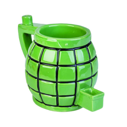 Grenade Wake &amp; Bake Coffee Mug
Wake up to an explosive double hit with this dual function mug
Holds coffee or tea in the cup, with a functional water pipe underneath
Novelty grenade design to start your day with a bang!
The mug liquid is completely separate from the pipe liquid and will not be contaminated by smoke
16.0(L) x 10.0(W) x 10.50(H) cm

1st Stop, Marshall's Health Shop, Gift Shop!

SKU: SA-WBM/G