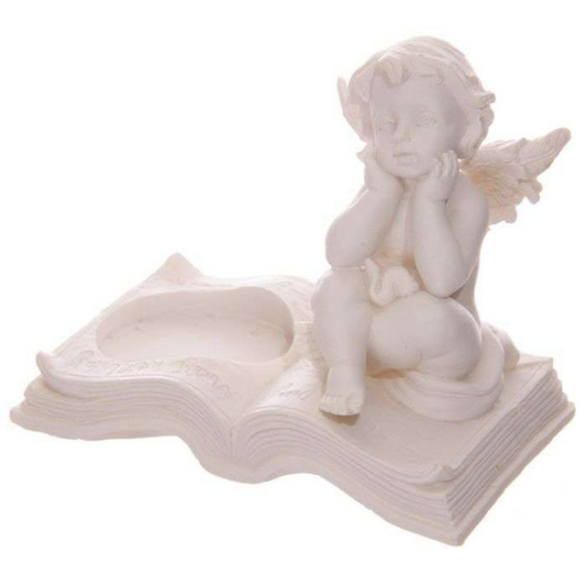 Cherubs Sitting on Book Tea Light Candle Holder Height 8cm Width 9.5cm Depth 5.5cm  Never leave a burning candle unattended. Place on a suitable heatproof surface. Keep away from children and pets.  SKU: CHE104