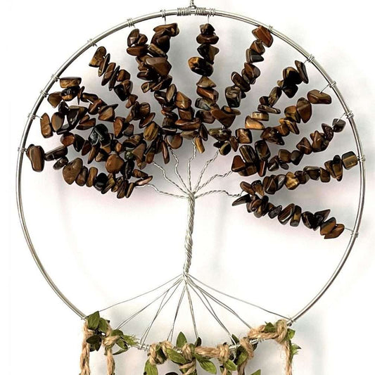 Decorative dreamcatcher with natural elements on a white background