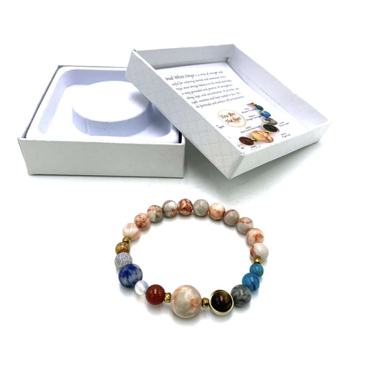 Jewelry box with a bracelet featuring various colored beads on a white background