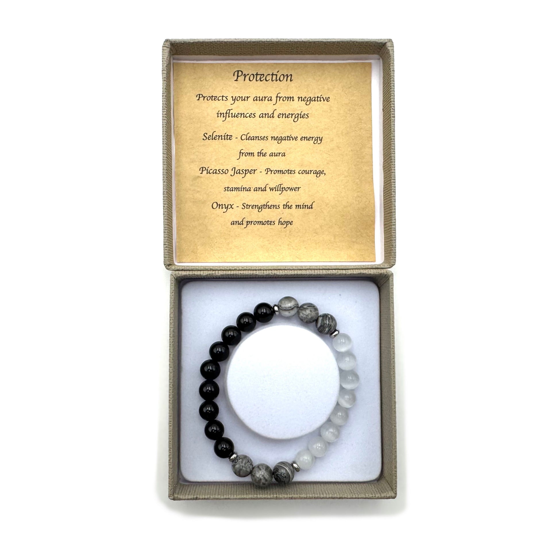 Protection Bracelet

Size: 8MM; With Selenite, Picasso Jasper, Onyx

1st Stop, Marshall's Health Shop, Gift Shop!

SKU: TB9