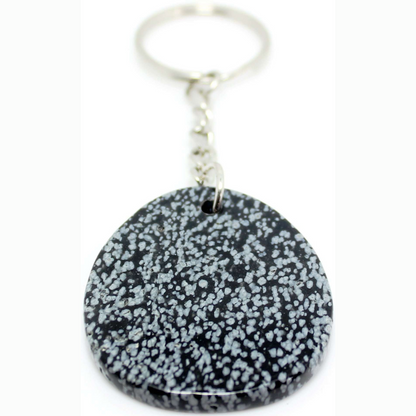 Zodiac Keyring Snowflake Obsidian Snowflake Obsidian – Capricorn: Associated with truth. Dissolves emotional blockages. Said to promote compassion and strength- Calming and soothing. Treats veins and skeleton.  Clarity- Compassion, strength. Relieves ancient traumas.  SKU: ZKOB