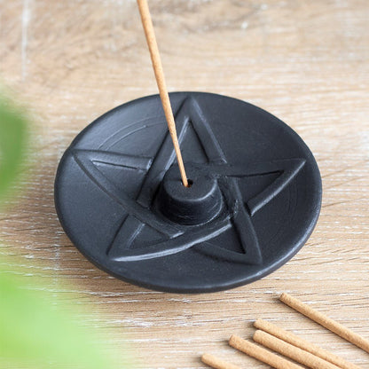 Black Pentagram Terracotta Incense Plate&nbsp;
H:2 x W:9 x D:9 cm This striking terracotta incense stick holder plate features a black pentagram design. Perfect in size for placing on a sacred altar or sunny windowsill.

1st Stop, Marshall's Health Shop, Gift Shop!
SKU: SDIN74230