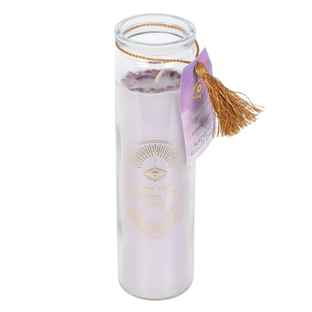 Blackberry Tube Candle with Amethyst Crystals

Inspired by traditional 7-day prayer candles, this tube candle comes in a beautiful blackberry fragrance. Accented with gold 'Turn your dreams into a reality' text and amethyst crystal chips, this candle promotes calm and relaxation. Crystals will release from wax with use and can be reused for a multitude of spiritual purposes. Paraffin wax. Approximately 50 hours of burn time. 1st Stop, Marshall's Health Shop, Gift Shop!