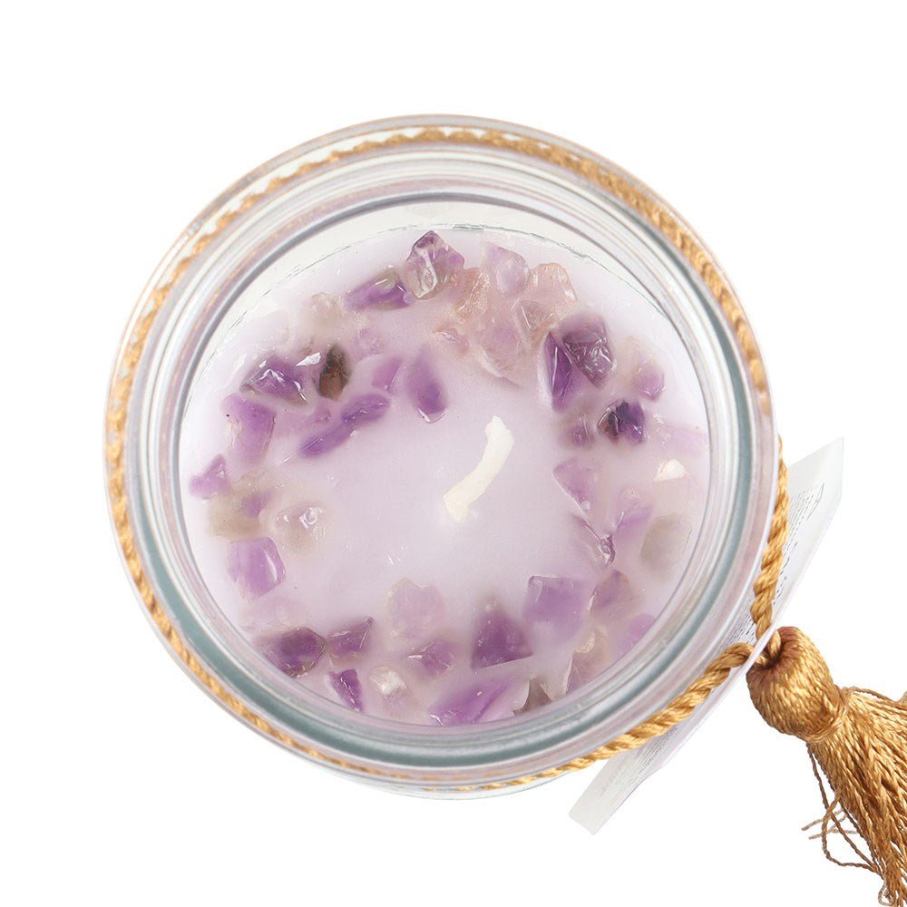 Blackberry Tube Candle with Amethyst Crystals

Inspired by traditional 7-day prayer candles, this tube candle comes in a beautiful blackberry fragrance. Accented with gold 'Turn your dreams into a reality' text and amethyst crystal chips, this candle promotes calm and relaxation. Crystals will release from wax with use and can be reused for a multitude of spiritual purposes. Paraffin wax. Approximately 50 hours of burn time. 1st Stop, Marshall's Health Shop, Gift Shop!