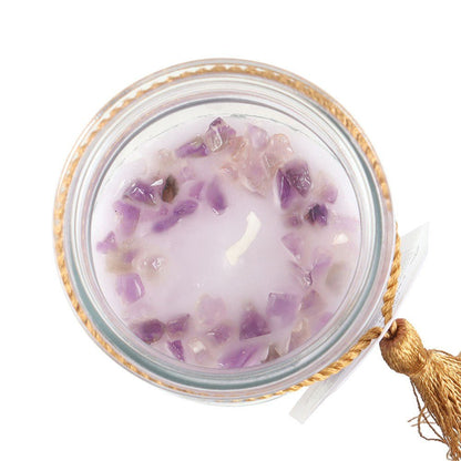 Blackberry Tube Candle with Amethyst Crystals

Inspired by traditional 7-day prayer candles, this tube candle comes in a beautiful blackberry fragrance. Accented with gold 'Turn your dreams into a reality' text and amethyst crystal chips, this candle promotes calm and relaxation. Crystals will release from wax with use and can be reused for a multitude of spiritual purposes. Paraffin wax. Approximately 50 hours of burn time. 1st Stop, Marshall's Health Shop, Gift Shop!