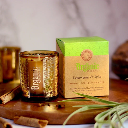 Candle Lemongrass &amp; Spice 200gm Organic Goodness
200 gram 50 hour burn time Smudge Scented Candle in gold foil glass prepared with natural soy wax, Lemongrass, Star Anise, Clove, Cinnamon, essential oils &amp; pure cotton wick. A purchase helps support over 10,000 families in India. It also helps support kids who are very poor by providing schooling. 1st Stop, Marshall's Health Shop, Gift Shop!