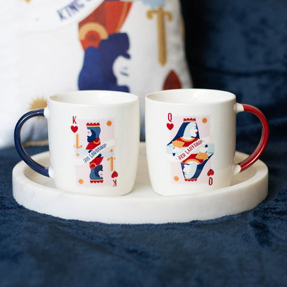 Ceramic Mug Her Ladyship &amp; His Lordship

Celebrate the perfect pair with the Her Ladyship &amp; His Lordship Couples Mug Set. Featuring matching designs in a white base with red and navy blue handles, these mugs are adorned with classic playing card motifs for the king and queen in your life. Ideal for anniversaries or as a charming gift for newlyweds. 350ml capacity each. Do not microwave. Hand wash only. Part of the King of Dads collection of gifts for Him.

1st Stop, Marshall's Health Shop, Gift Shop