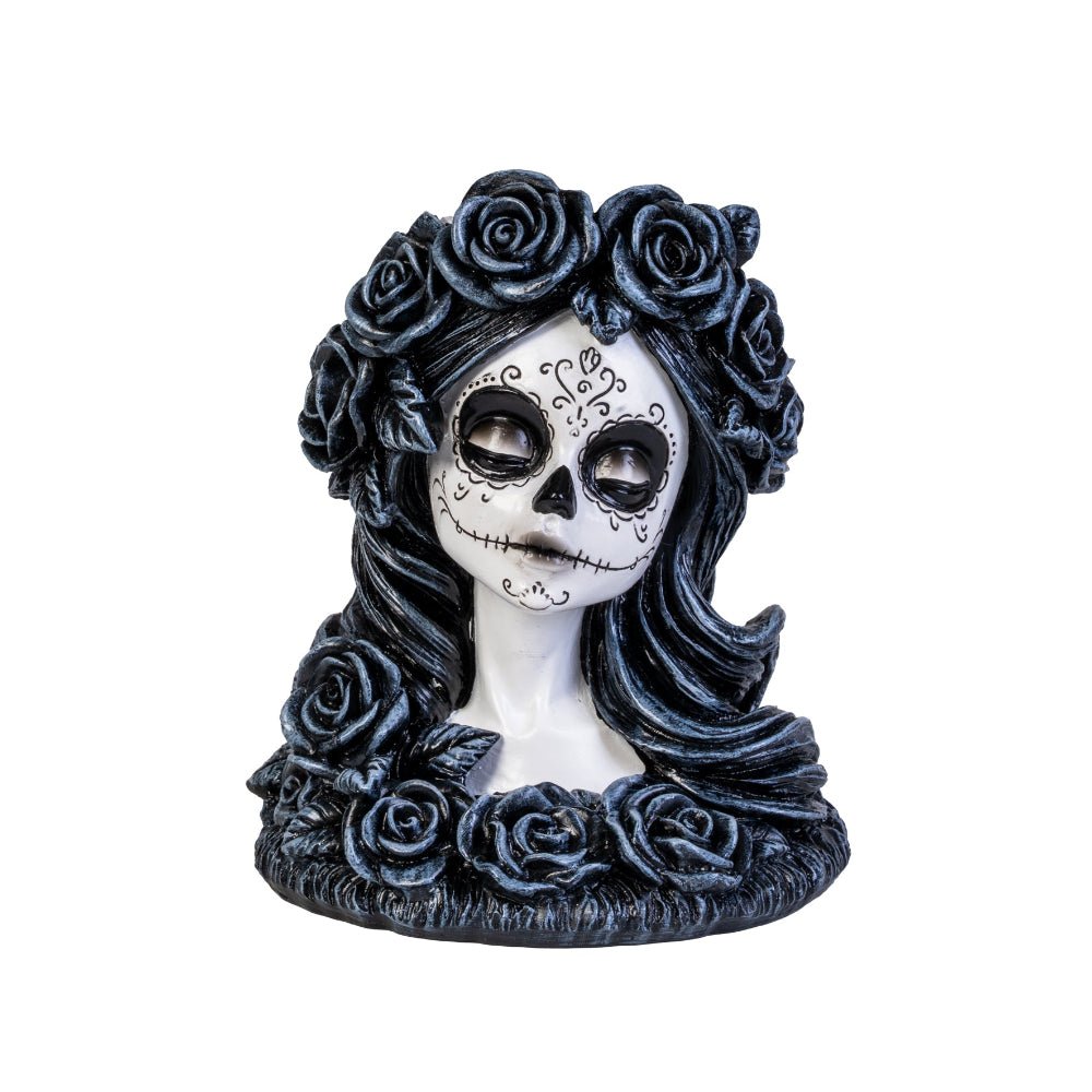 Meet the Dead Beautiful Tealight Holder, your new gothic table companion! Crafted in the likeness of a sweet yet spooky sugar skull maiden, this candle holder is ready to haunt your home with a delightful touch of mystery and charm. Complete with intricately sculpted roses and Day of the Dead face art, she is as perfect for a chilling dinner party as she is for turning any ordinary night into an enchanting spectacle!  1st Stop, Marshall's Health Shop, Gift Shop!