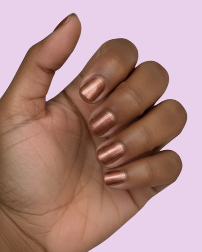 Nail Polish - Rosewood

A molten copper-bronze that catches the light like sunset on summer skin. Earthy, luxe, and bold.
1st Stop, Marshall's Health Shop!