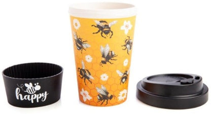 Eco-to-Go Bamboo Cup - JoyBee Eco-friendly travel cup made from bamboo Features fuzzy bees and white flowers on a warm honeycomb background Matching black anti-spill lid and protective silicone band with ‘Boss Bitch’ text Holds approximately 470 ml 10(L) x 10(W) x 14(H) cm SKU: LT-EGC/BH