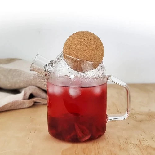 MagicT -  Cork Lid Teapot 450cc The glass cork lid teapot is transparent and clear and made of high borosilicate glass making it resistant to cold or hot drinks.  It has a capacity of 450 ml and its spring strainer in the nozzle makes it easier to use for both hot and cold tea.