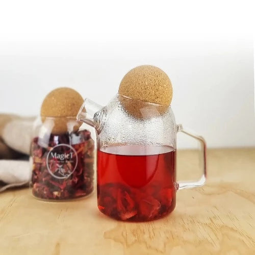 MagicT -  Cork Lid Teapot 450cc The glass cork lid teapot is transparent and clear and made of high borosilicate glass making it resistant to cold or hot drinks.  It has a capacity of 450 ml and its spring strainer in the nozzle makes it easier to use for both hot and cold tea.