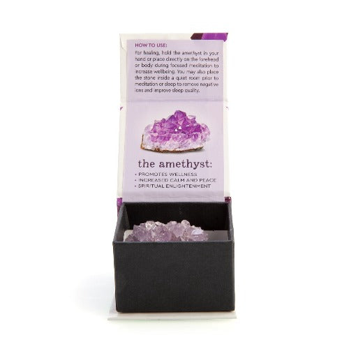 Raw Amethyst Wellness Stone Raw uncut amethyst stone approx. 5 cm wide Amethyst is linked to peace, tranquility and relaxation Comes in a magnetic gift box with wellness info 5.90(L) x 4.0(W) x 5.90(H) cm Gift box SKU: DF-GS/AM