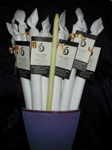 Ear Candles by Louise  Ear Candles by Louise are handmade from natural Canterbury beeswax lined with 100% cotton.  We do not add any fragrance, oils or chemicals to our ear candles for allergy sufferers and asthmatics.  Our ear candles are 30cms long and have one tapered end. Each pair is packaged with instructions inside.