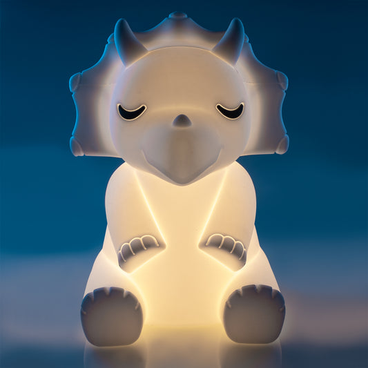 Lil Dreamers Triceratops Soft Touch LED Light Adorable sleeping triceratops LED touch lamp Activate and adjust 6 levels of brightness with just a touch Soft silicone casing with efficient LED bulb Rechargeable battery with included charging cord 15(L) x 13.5(W) x 18(H) cm Lithium not replaceable LED bulb not replaceable SKU: RS-LTL/TC