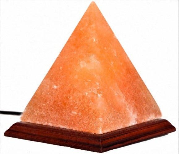 Himalayan Salt Lamp Pyramid Shaped (SPY6) Capture the ambience of the Egyptian pyramids! This Beautify, hand carved salt lamp sits on a stylish wooden base. It brings a warm glow to your living spaces as it cleans and purifies the air.  Pyramid shaped plug-in lamp on a wood base  Each lamp is hand carved from 100% natural Himalayan salt  Salt lamps create a soothing amber glow  Authentic Himalayan Salt Lamp. Each item comes with an electric cable and a bulb.  Dimensions: Height 15cm  SKU: SPY6