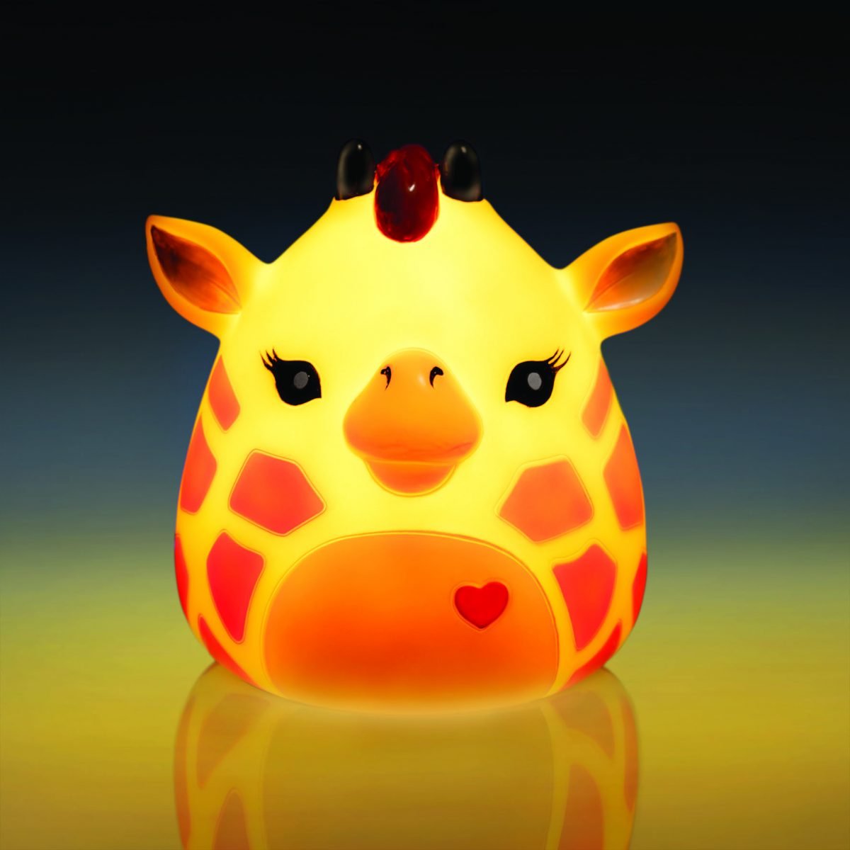 Smoosho’s Pals Giraffe Table Lamp Adorable giraffe table lamp based on our lovable Smoosho’s Pals! Lights up the room with a comforting warm glow Makes a magical ornament during the day Low voltage LED safe for children The adorable Smoosho’s Pals Giraffe lamp is the perfect combo of function and decor! It blends right into a fun kid’s room during the day, and lights up with a golden glow at night. Great for bedtime stories or as a nightlight to ensure sweet dreams for your little one.