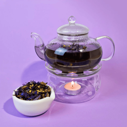 MagicT - Glass Teapot and Warmer Set 600cc MagicT Teapot family is getting bigger. This teapot is perfect for four people serving and it comes with MagicT's gorgeous warmer.  High-quality borosilicate heat resistant glass flower teapot  600ml +1pc warmer Teapot Set. The Teapot has glass infuser which makes it perfect for brewing herbal tea.
