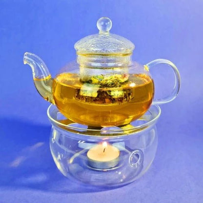 MagicT - Glass Teapot and Warmer Set 600cc MagicT Teapot family is getting bigger. This teapot is perfect for four people serving and it comes with MagicT's gorgeous warmer.  High-quality borosilicate heat resistant glass flower teapot  600ml +1pc warmer Teapot Set. The Teapot has glass infuser which makes it perfect for brewing herbal tea.